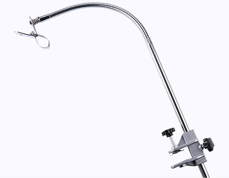 Hair dryer holder for grooming table